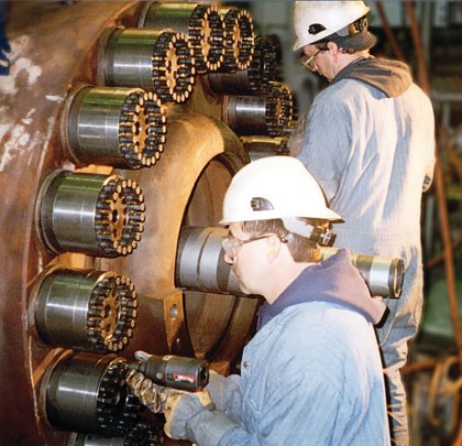 Worker using a Superbolt torque tool